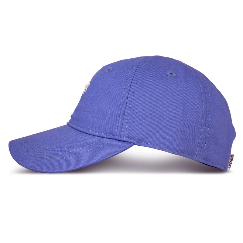 A side view of the Next Level Cap by Roxy, a women’s baseball hat in plain purple, is displayed on a white background. It features a curved visor and is crafted from soft cotton twill.
