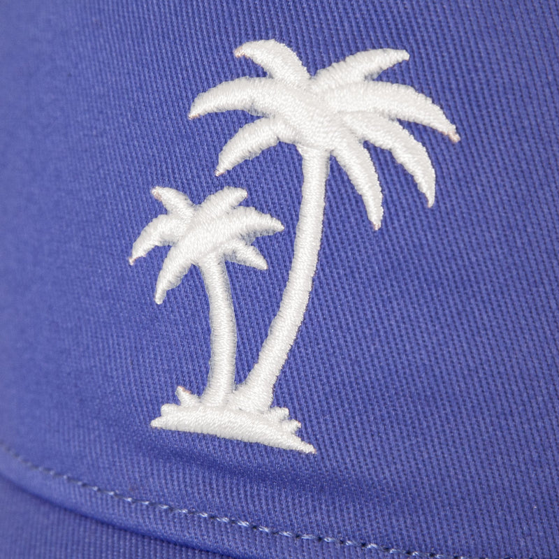 Close-up of two white embroidered palm trees on purple cotton twill fabric from the Roxy Next Level Cap, perfect for a women’s baseball hat with a curved visor.