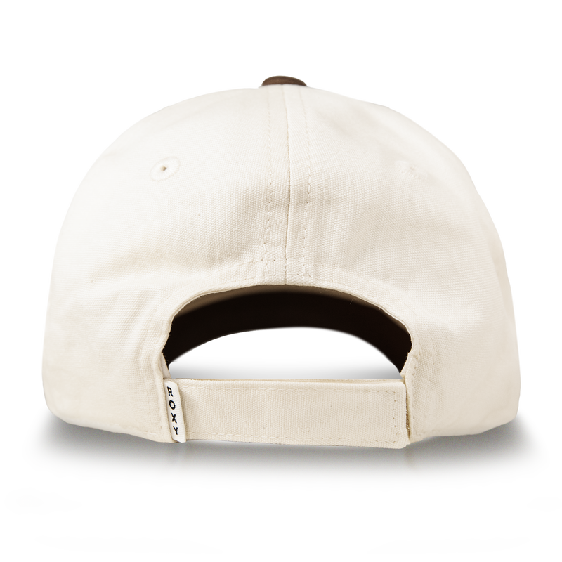 A beige Roxy Next Level Cap for women is pictured from the back, showcasing its adjustable strap with a small white tag labeled ROXY. Crafted from soft cotton twill and finished with a classic curved visor, this baseball hat is set against a clean white background.