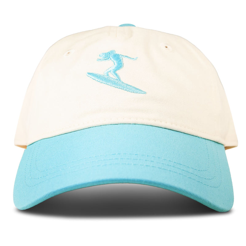 Introducing the Roxy Next Level Cap, a women’s baseball hat in tanager turquoise and white cotton twill, featuring a light blue curved visor and a light blue embroidered surfer on a surfboard on the front.