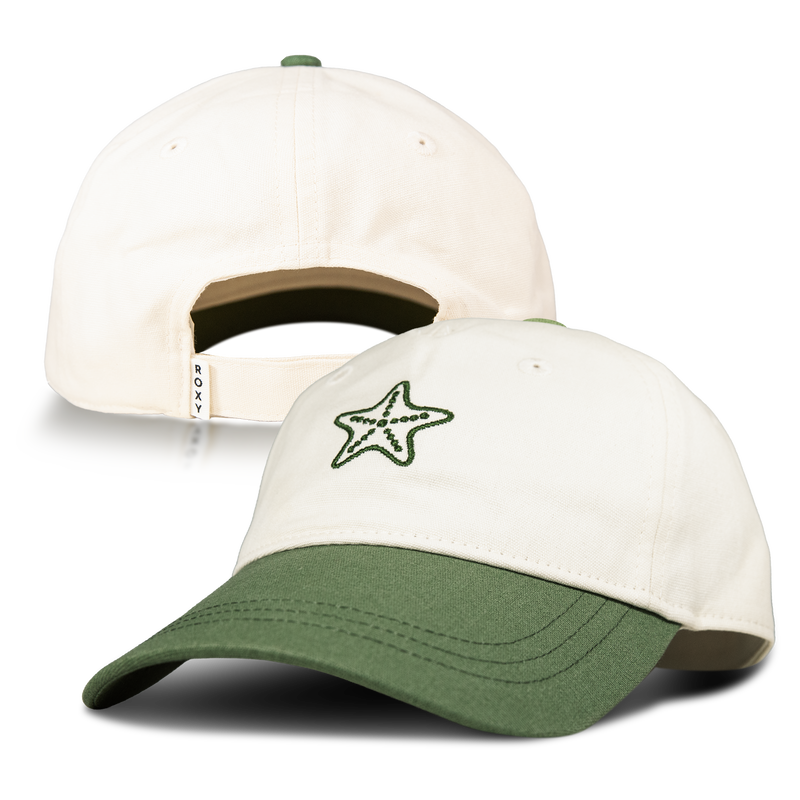 The Roxy Next Level Cap is a women’s baseball hat in cream and green, crafted from soft cotton twill with a curved visor, an adjustable back strap, and a green starfish embroidered on the front.