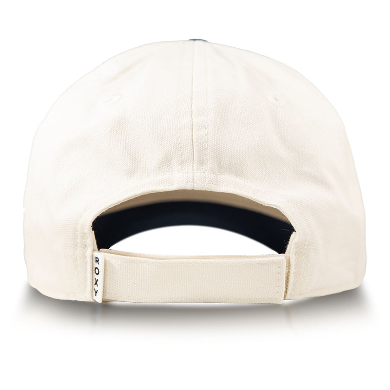 Back view of the cream-colored Roxy Next Level Cap, crafted from soft cotton twill and featuring an adjustable strap with a small ROXY tag on the left side. The classic curved visor adds timeless style.