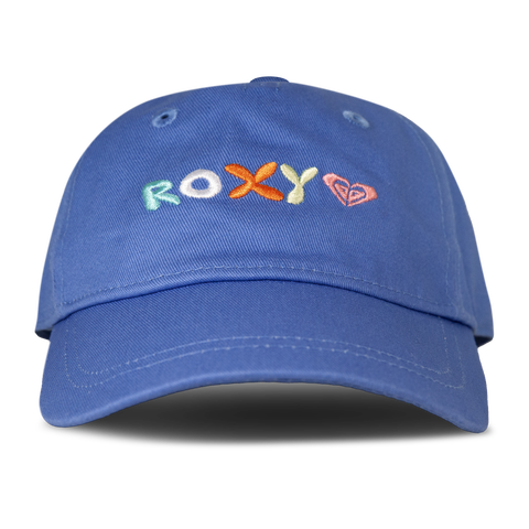 The TW Next Level Baseball Cap by Roxy features a vibrant Very Peri color, colorful ROXY embroidery, and a heart-shaped logo on the front, making it a stylish and modern accessory for any outfit.