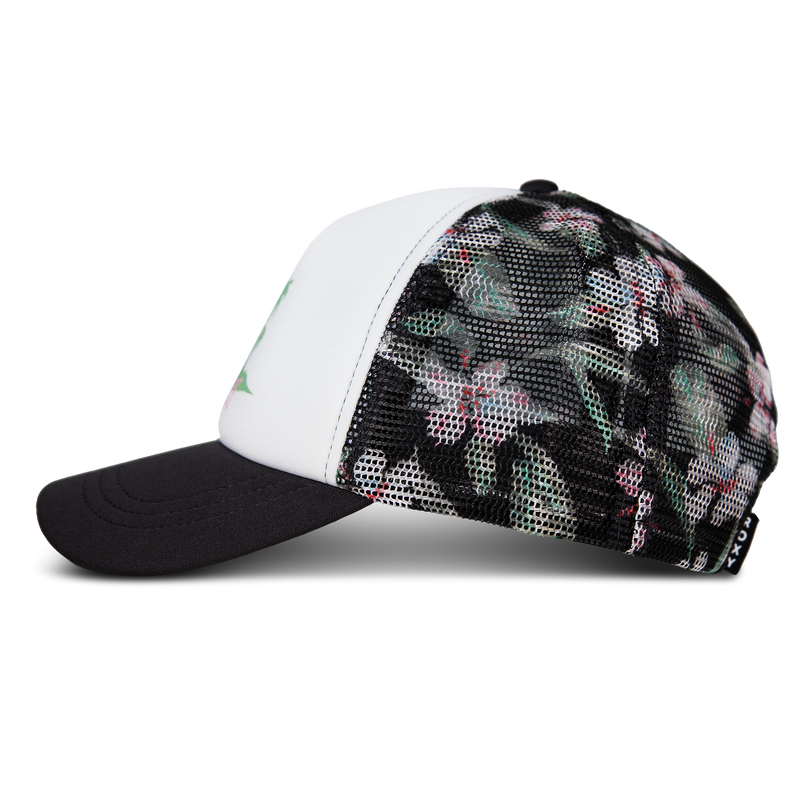 A Roxy Donut Spain Trucker hat with a white front panel, black brim, and black mesh sides accented by a floral pattern of green leaves and pink flowers—an ideal casual accessory for any relaxed outfit.