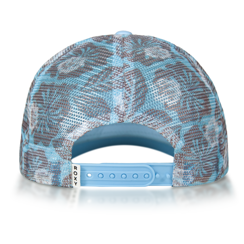 A blue floral-patterned baseball cap viewed from the back, this trucker hat features a mesh design and an adjustable plastic strap with a small white tag that says ROXY, making it a stylish casual accessory.