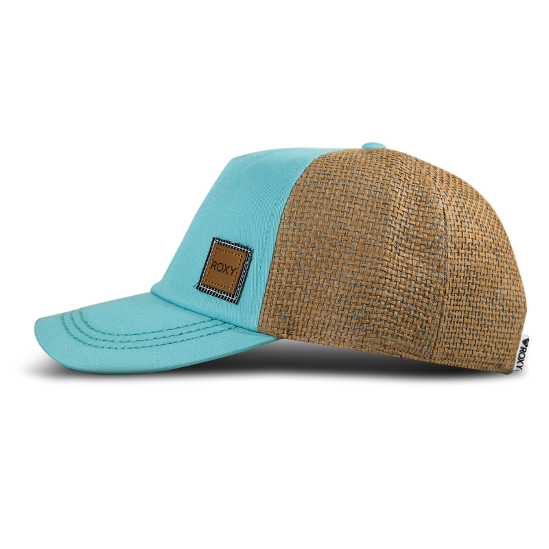 Introducing the Incognito Cap by Roxy—a stylish accessory for women featuring a blue front and brim, contrasted with a brown woven back. Accented with a small square leather patch on the front, this cotton linen cap perfectly blends comfort with contemporary design, making it an ideal choice for any casual outfit.