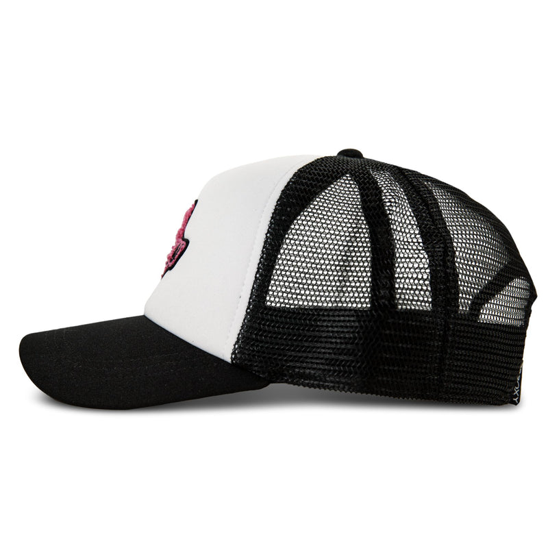The Roxy Island Ride Trucker hat is displayed in a side profile view, featuring a white front panel, black bill, and black mesh back with an adjustable snapback for a comfortable fit.
