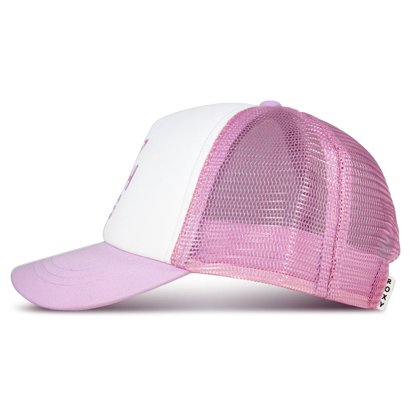 A side view of the Sandy Top Trucker by Roxy showcases a pink and white trucker cap featuring a mesh back and curved brim for style and sun protection. The adjustable snapback provides a comfortable fit, while a small white tag with black text is attached to the back.