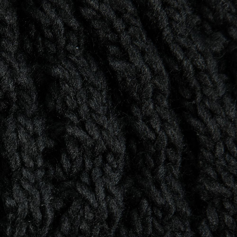Close-up of a black Roxy Blizzard Beanie featuring a chunky knit.