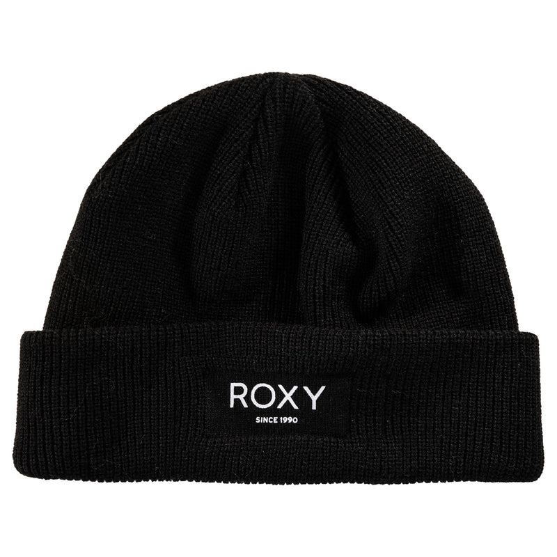 The Blizzard Beanie by Roxy is a black chunky knit beanie with a folded brim, featuring a cozy fleece lining and a rectangular black patch on the front with white “ROXY SINCE 1990” text.