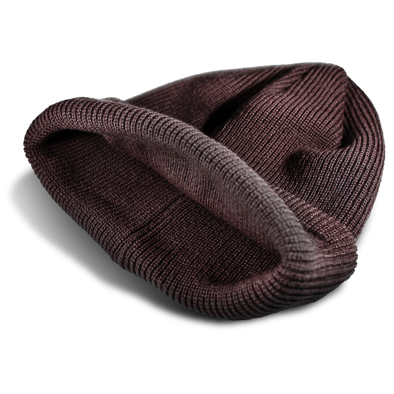 A dark brown Roxy Folker Beanie in a rib knit with a folded cuff.