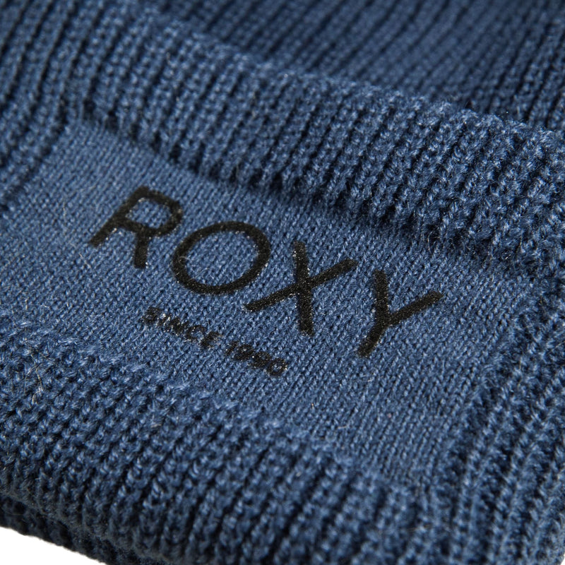 Blue ROXY Folker Beanie in a rib knit with the brand name printed on the cuff.