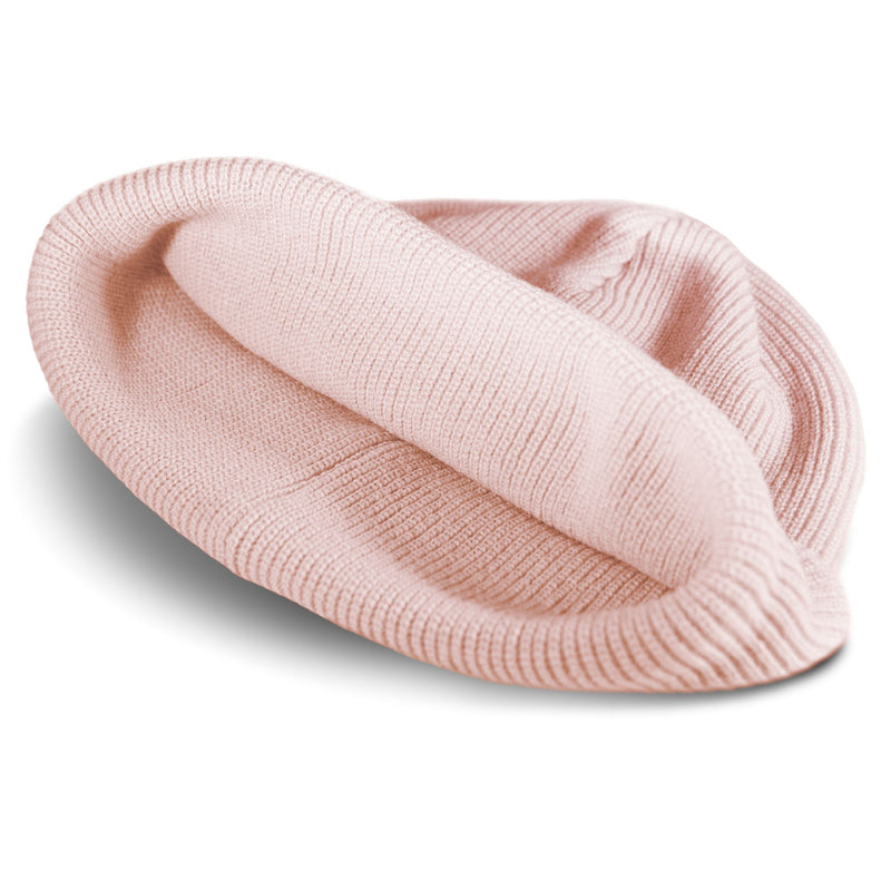 Light pink Roxy Folker Beanie in a rib knit.