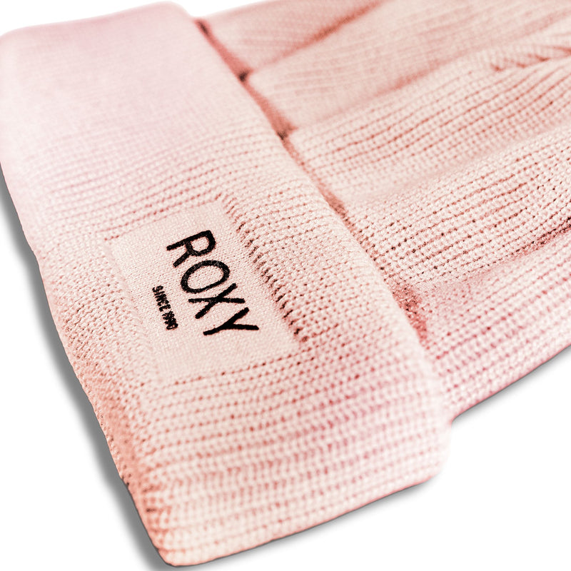 Light pink Roxy Folker Beanie in a rib knit featuring a rectangular patch with the text ROXY SINCE 1990 on the cuff.