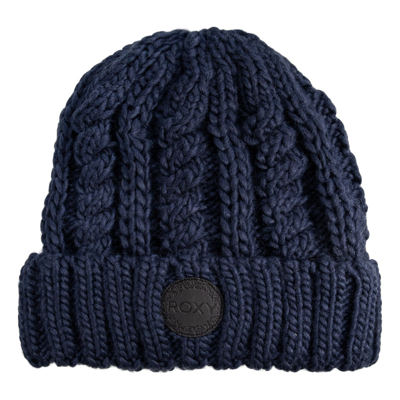 The Roxy Tram Beanie is a dark blue, chunky cable knit women’s accessory featuring a folded brim and a round ROXY patch on the front; it’s fleece lined for extra warmth and comfort.