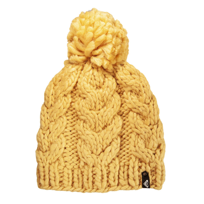 The Roxy Winter Beanie in ochre is a women’s knitted hat featuring a chunky cable pattern and a large pom-pom on top, complete with a cozy fleece lining for extra warmth, shown against a white background.