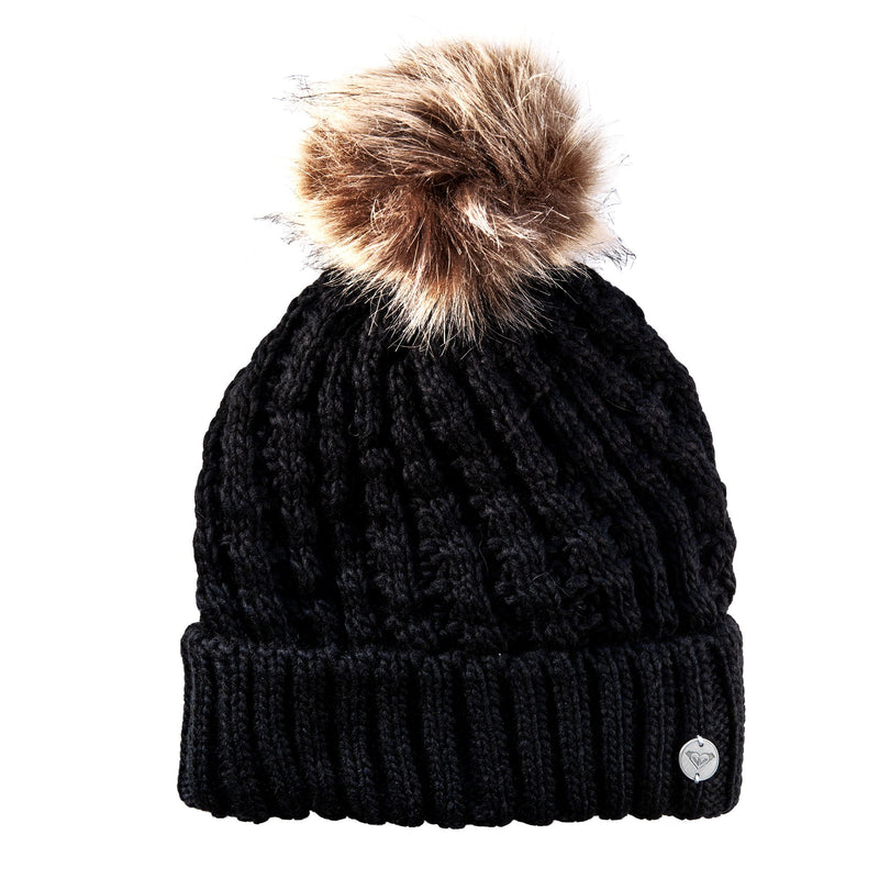 The Roxy Girls Blizzard Girl Beanie by Roxy features a black cable knit design with a folded brim and a large, fluffy brown faux fur pom-pom on top. It includes a cozy polar fleece lining for added warmth and is displayed against a white background.
