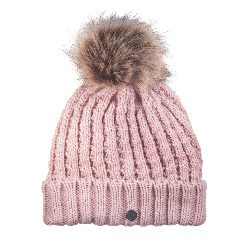 The Roxy Girls Blizzard Girl Beanie by Roxy, shown in Zephyr pink, features a cable knit design with a folded brim and a large faux fur pom-pom on top. It includes a soft polar fleece lining for extra warmth and is displayed against a white background.