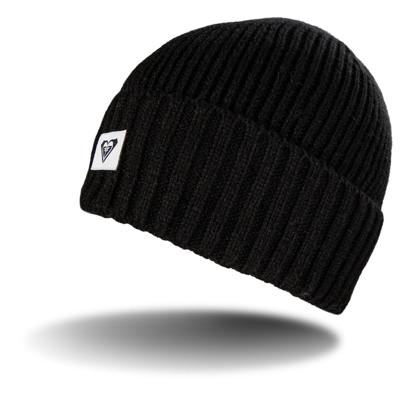Black rib knit Roxy Girls So Peaceful Beanie with a folded cuff and a small square patch featuring a heart-shaped ROXY logo.