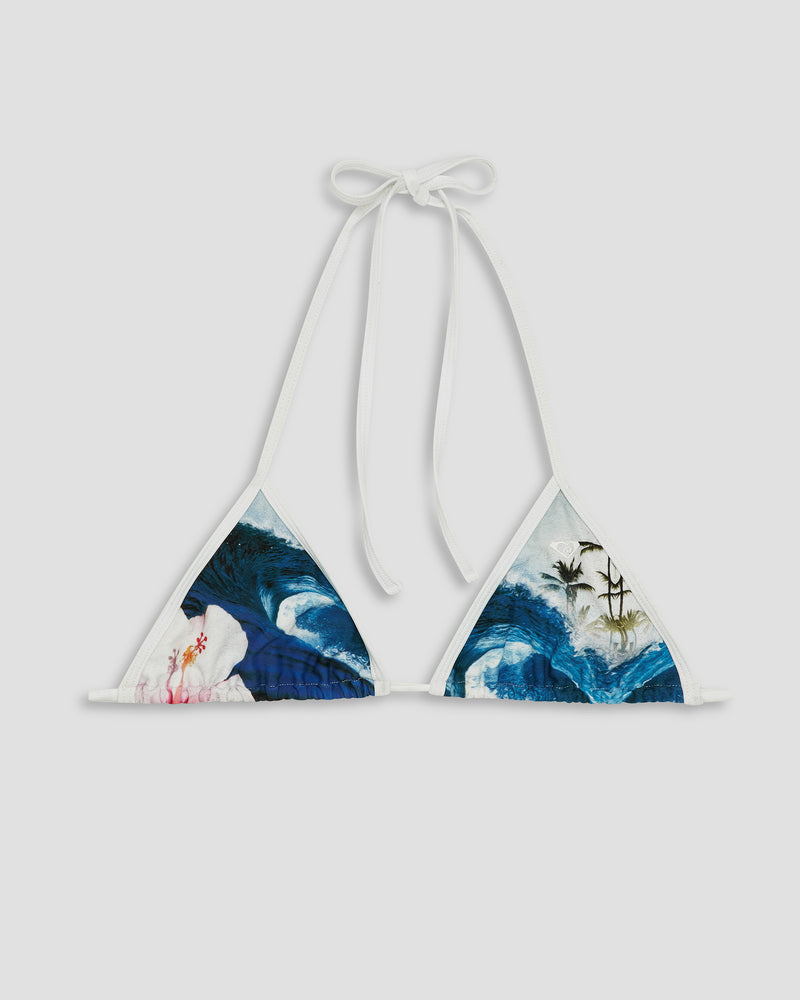 The Roxy Kauai Bikini Top features a triangle design with white straps, an ocean blues wave print, and subtle floral details.
