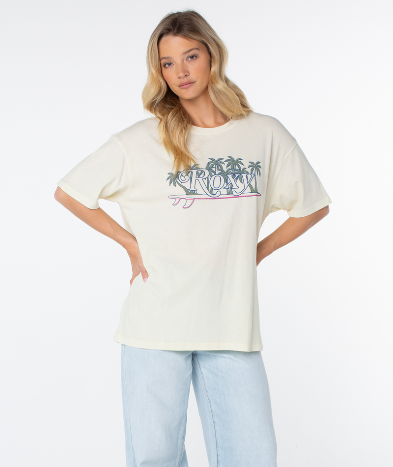 Cream-colored Roxy Sunny State oversized tee featuring a beachy-chic palm tree and surfboard graphic across the chest.