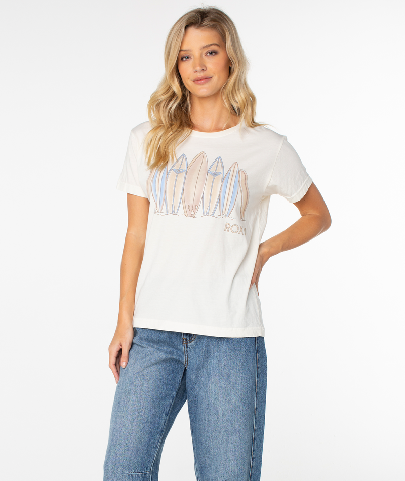 A slouchy, cream-colored Dad Vibes Surfboard Tee featuring a graphic of multiple surfboards and the text ROXY on the chest.