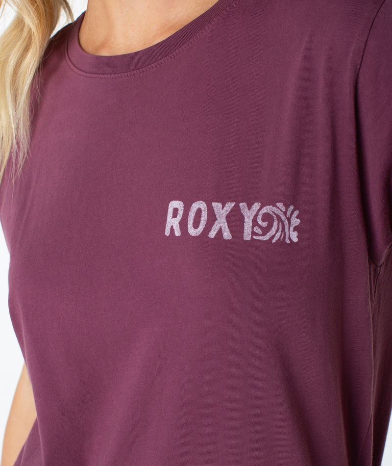 Close-up of a maroon Roxy Simple Palm Top featuring a crew-neck and a light-colored brand logo printed on the left chest.