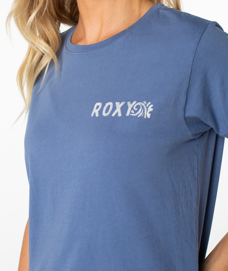 A blue Roxy Simple Palm top with a crew neck and a white logo printed on the upper left chest.