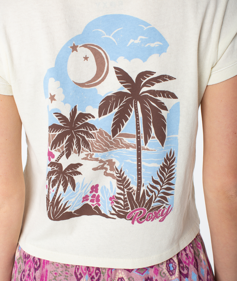 Cream-colored Roxy Moon Beach Top with a coastal cool graphic on the back featuring palm trees, a beach, a crescent moon, and stylized lettering.