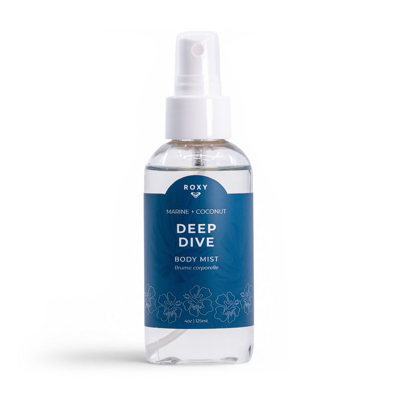 A clear spray bottle labeled Roxy Deep Dive Body Mist, featuring marine, coconut, and waterlily scents with a blue label and white floral graphics, set against a white background.