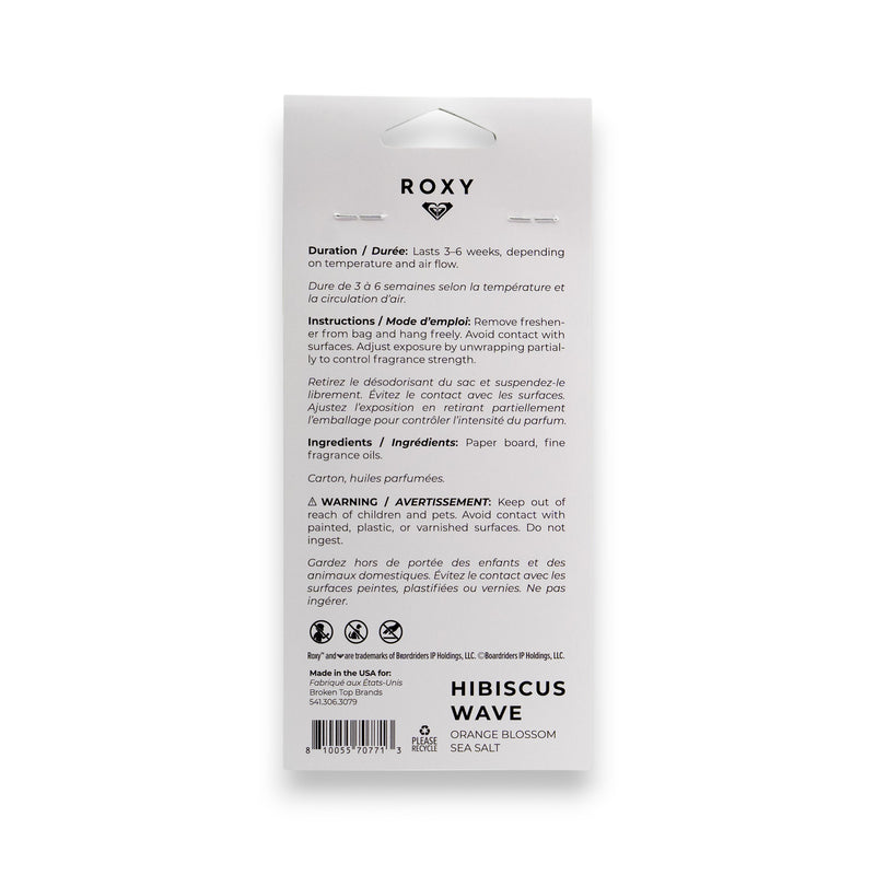 Back of a Roxy Hibiscus Wave Palm Air Freshener package listing scent notes (tropical hibiscus wave, orange blossom, sea salt), duration, use instructions, contents, warnings, and manufacturer info in English/French; barcode on bottom.