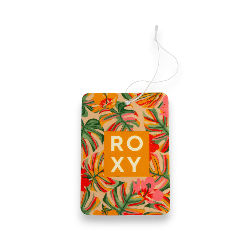 The Roxy Sun Drift Palm Air Freshener features a rectangular design with tropical leaf and flower patterns in green, orange, and pink, a refreshing sunlit scent, bold ROXY text on an orange square, and a white hanging string at the top.