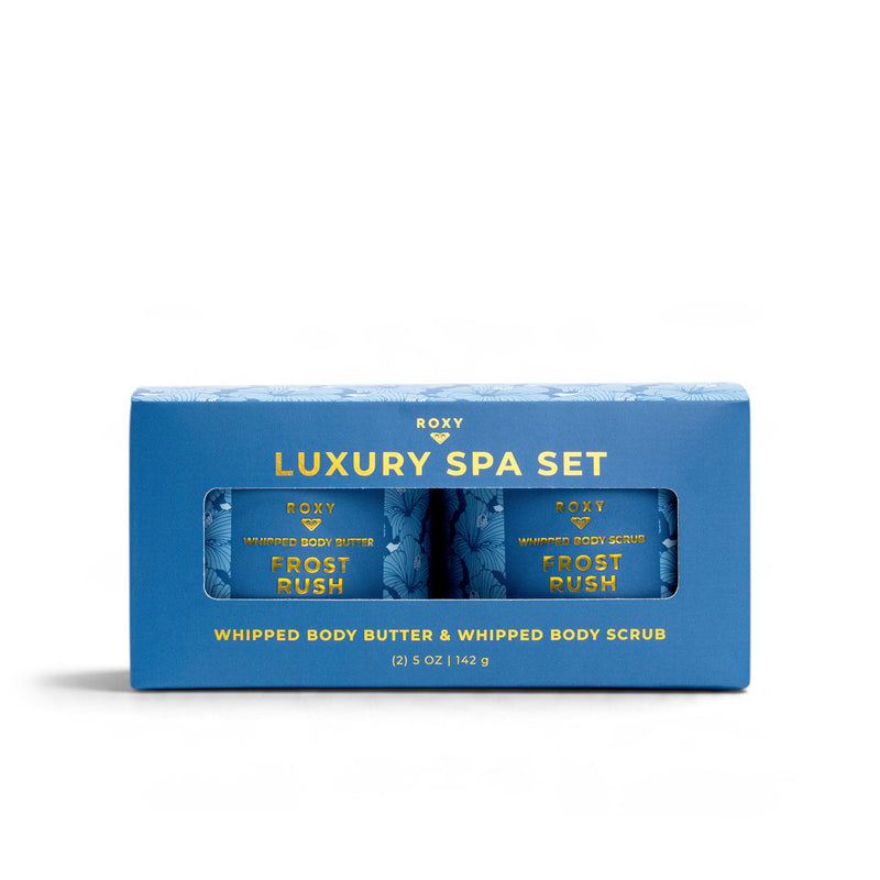 A Frost Rush Holiday Luxury Spa Set containing a container of whipped body butter and a container of whipped body scrub.
