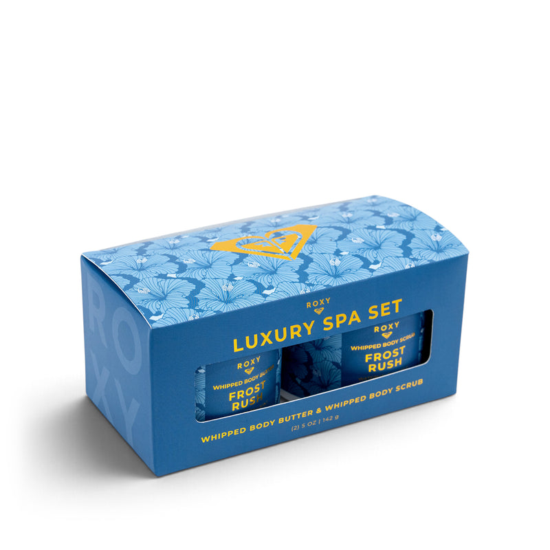 A blue rectangular Frost Rush Holiday Luxury Spa Set gift box containing a body scrub and whipped body butter.