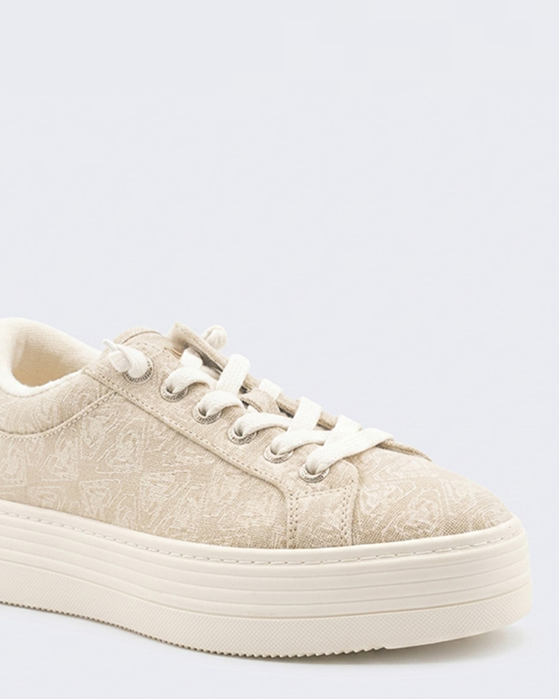 The Roxy Sheilahh 2.0 Sneaker is a beige platform shoe with a textured pattern, white laces, and a thick off-white sole, displayed against a plain light background.