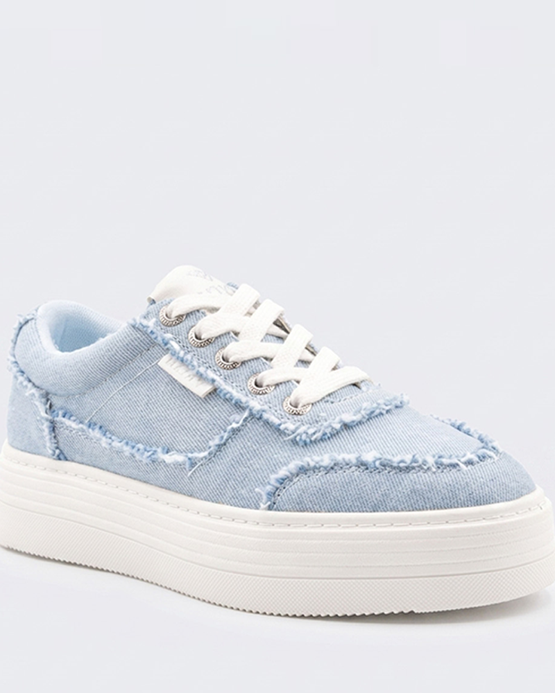 The Roxy Sheilahh 2.0 Sneaker features light blue denim with frayed edges, white laces, and a chunky white rubber sole, shown against a plain light background.