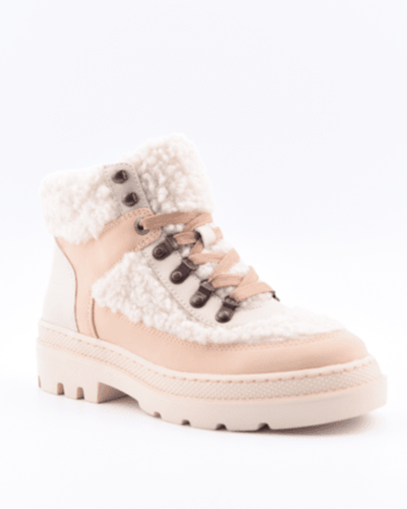 The Roxy Venture Out Lace-Up Hiker Boot features a beige and white design, chunky sole, metal eyelets, and cozy faux shearling trim and lining—ideal for stylish comfort on your next adventure.