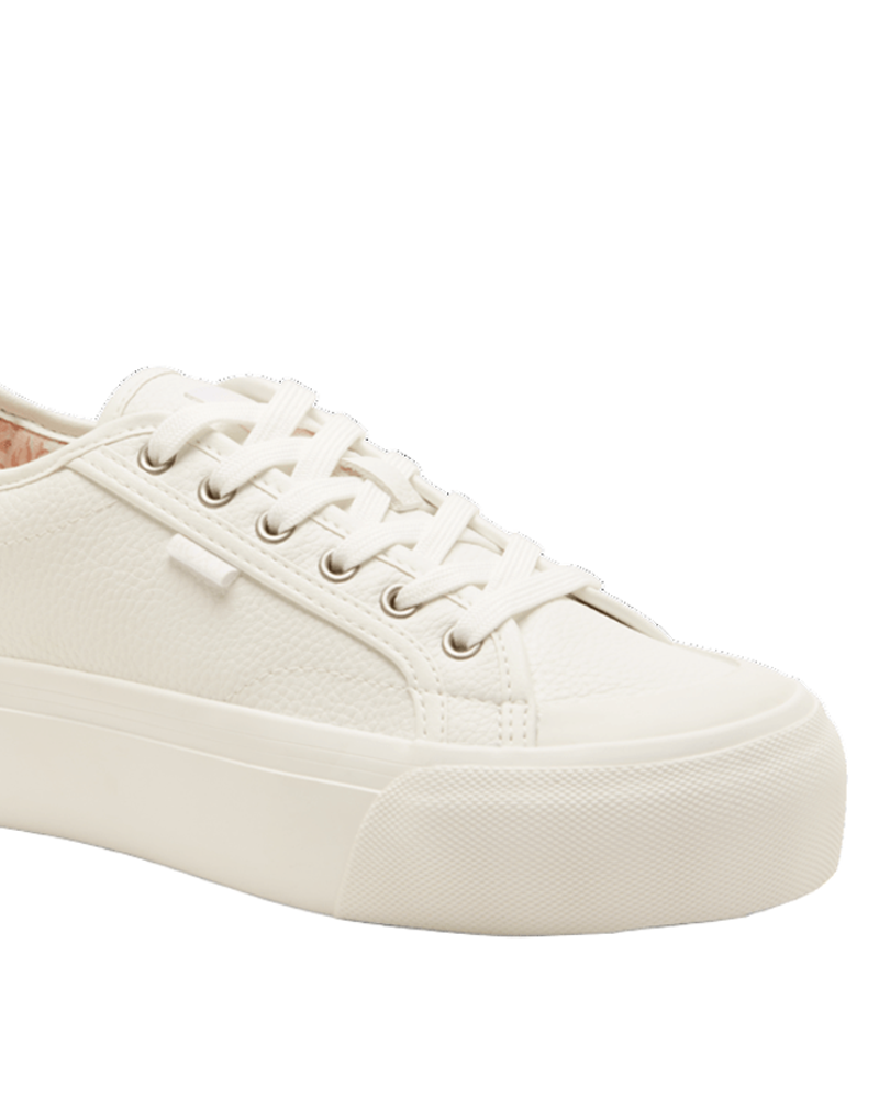 The Roxy Cruizer LX Sneaker is a white low-top with a textured leather upper, white laces, and a thick rubber sole. Its minimal detailing gives this sneaker a clean, classic look.