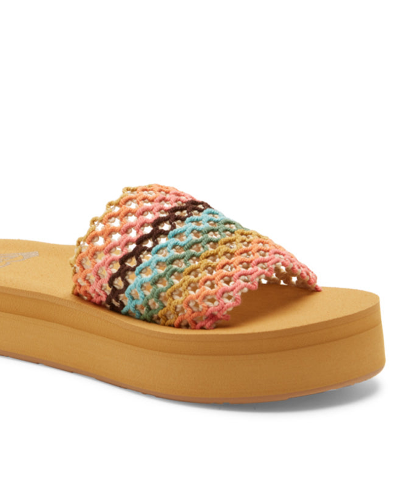 The Roxy Dayzie Platform Sandal features a thick tan sole and a wide, multicolored woven strap in pink, orange, blue, and brown.