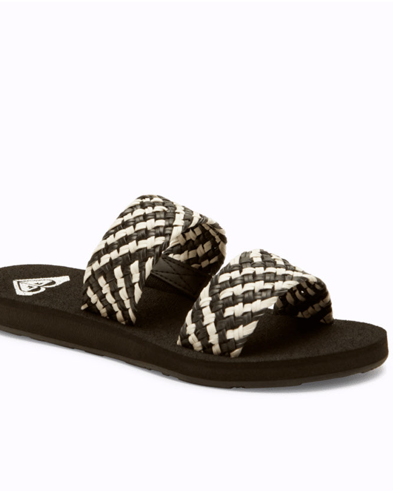 The Roxy Dayzie Sandal features two thick, woven black and white straps and a flat black sole, shown at an angle on a white background.