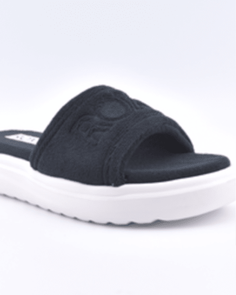 The Roxy Gelato Sandal is a black slide with an open toe, thick cushioned strap, and chunky white sole, shown at an angle on a plain white background.